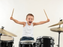 Boy taking drum lessons